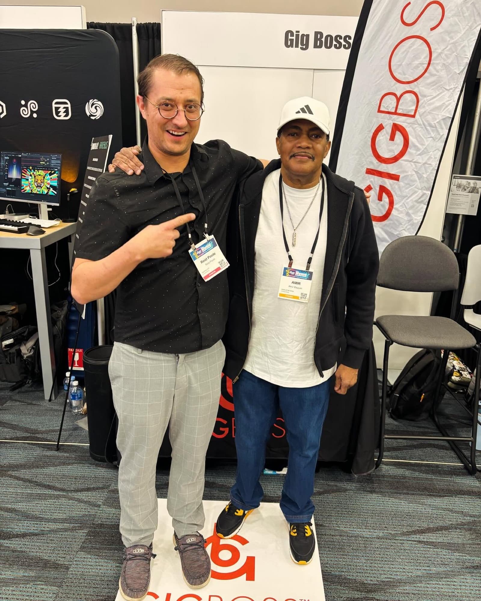 Reid Poole at the GigBoss booth during a music industry convention